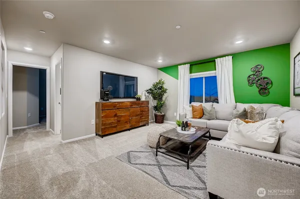 a living room with furniture and window