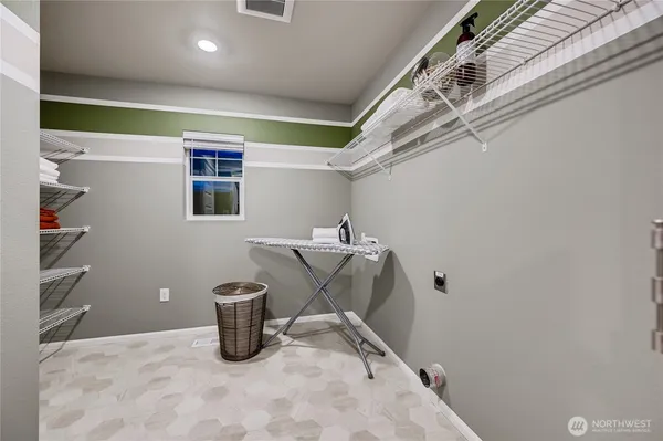 a view of storage and utility room