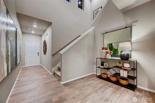 a view of entryway with wooden floor