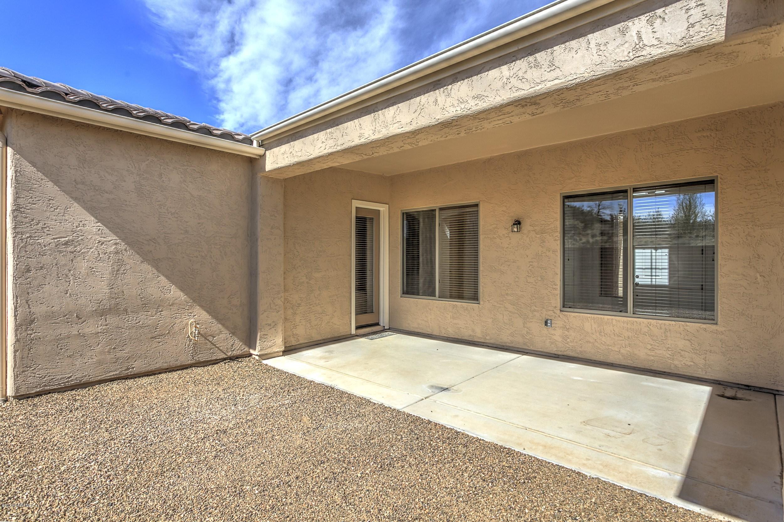 7453 East Beaver Valley Road Prescott Valley, AZ 86314 - Photo 19 of 30 019_Covered Rear Patio Yard