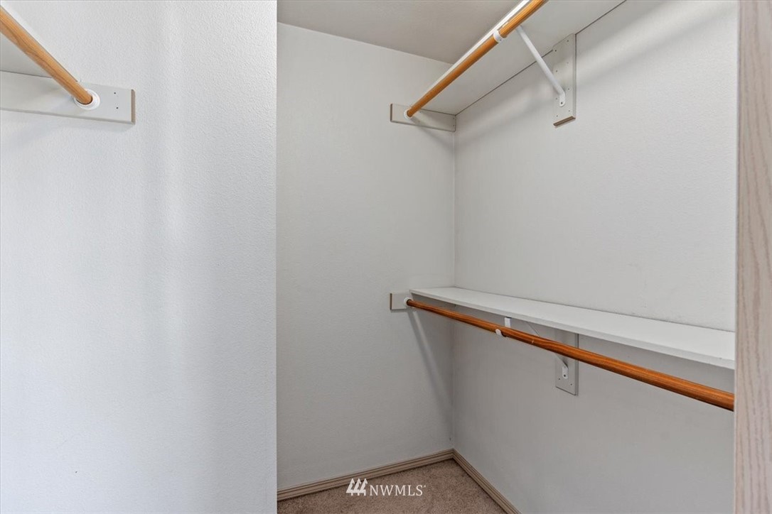 1160 Monroe Avenue Northeast, Unit B1 Renton, WA 98056 - Photo 12 of 24 a view of a room with racks on the wall