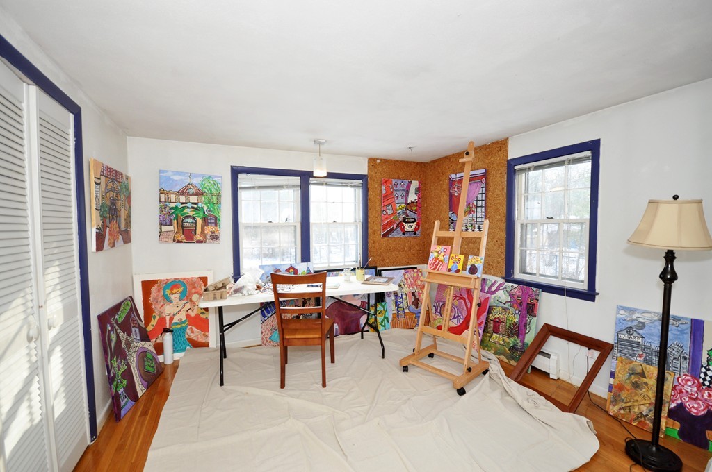 12 Mitchell Road Stow, MA 01775 - Photo 17 of 27 a living room with furniture and a large window