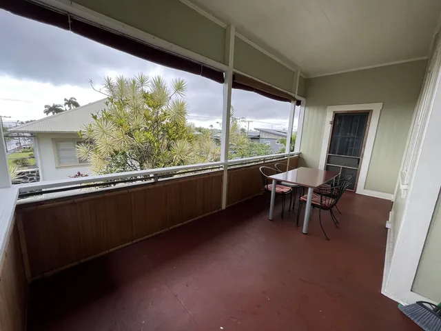 a view of a two chair in the balcony