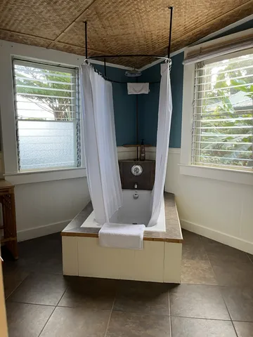 a bath room with a window