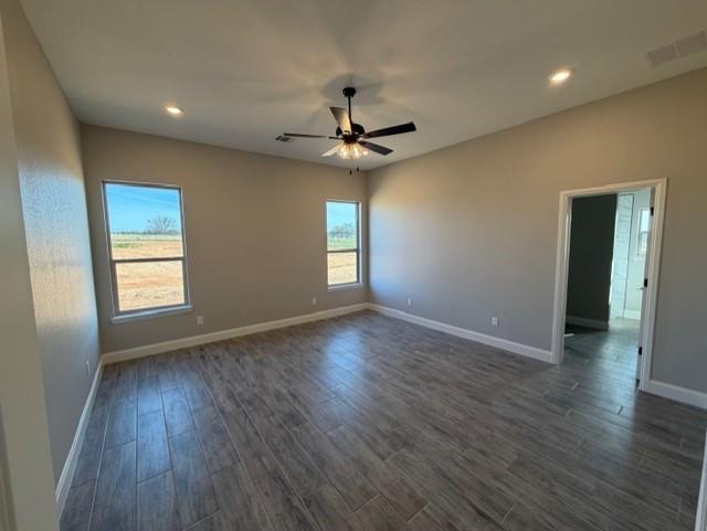 230 Kilkenny Road Poolville, TX 76487 - Photo 13 of 22 wooden floor in an empty room with a window
