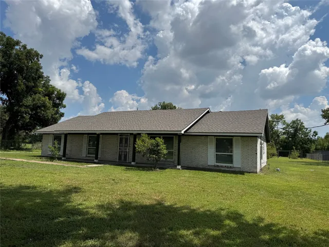 a kitchen with a table and chairs in it