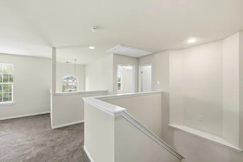 a view of storage and utility room with racks on the wall