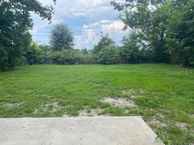 a view of outdoor space and yard