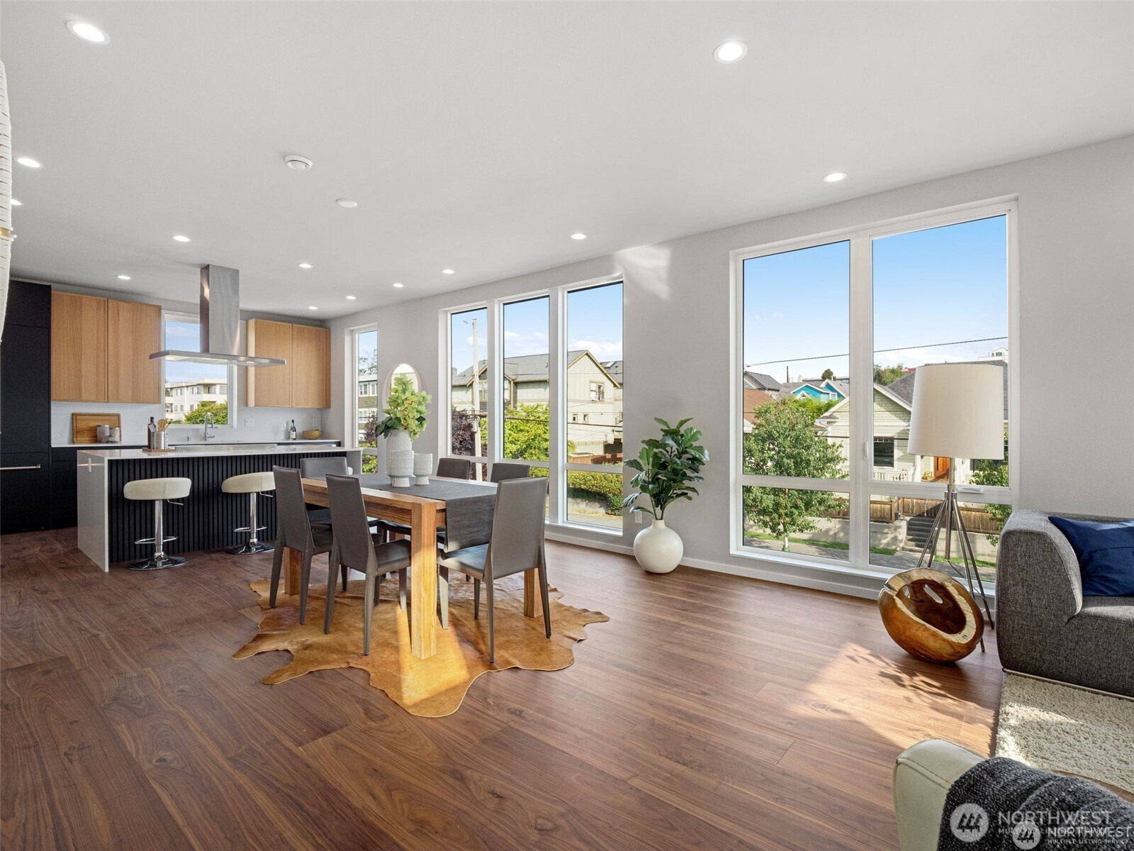 4464 Midvale Avenue North Seattle, WA 98103 - Photo 11 of 27 a view of a dining room with furniture window and wooden floor