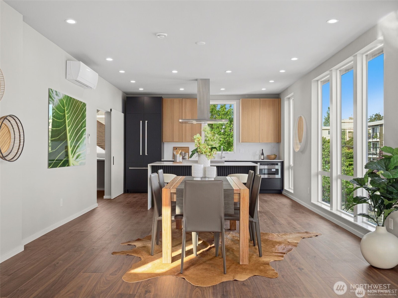 4464 Midvale Avenue North Seattle, WA 98103 - Photo 12 of 27 a view of a dining room with furniture window and wooden floor