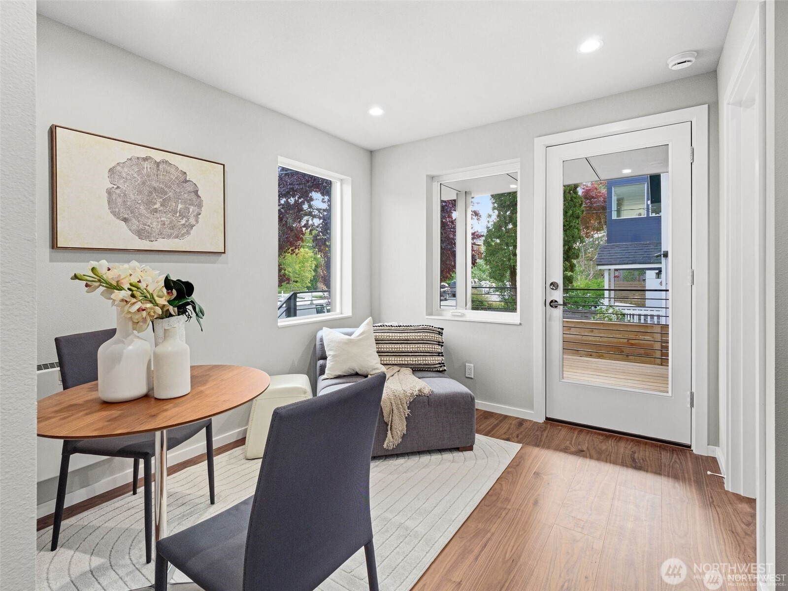4464 Midvale Avenue North Seattle, WA 98103 - Photo 2 of 27 a living room with furniture and wooden floor