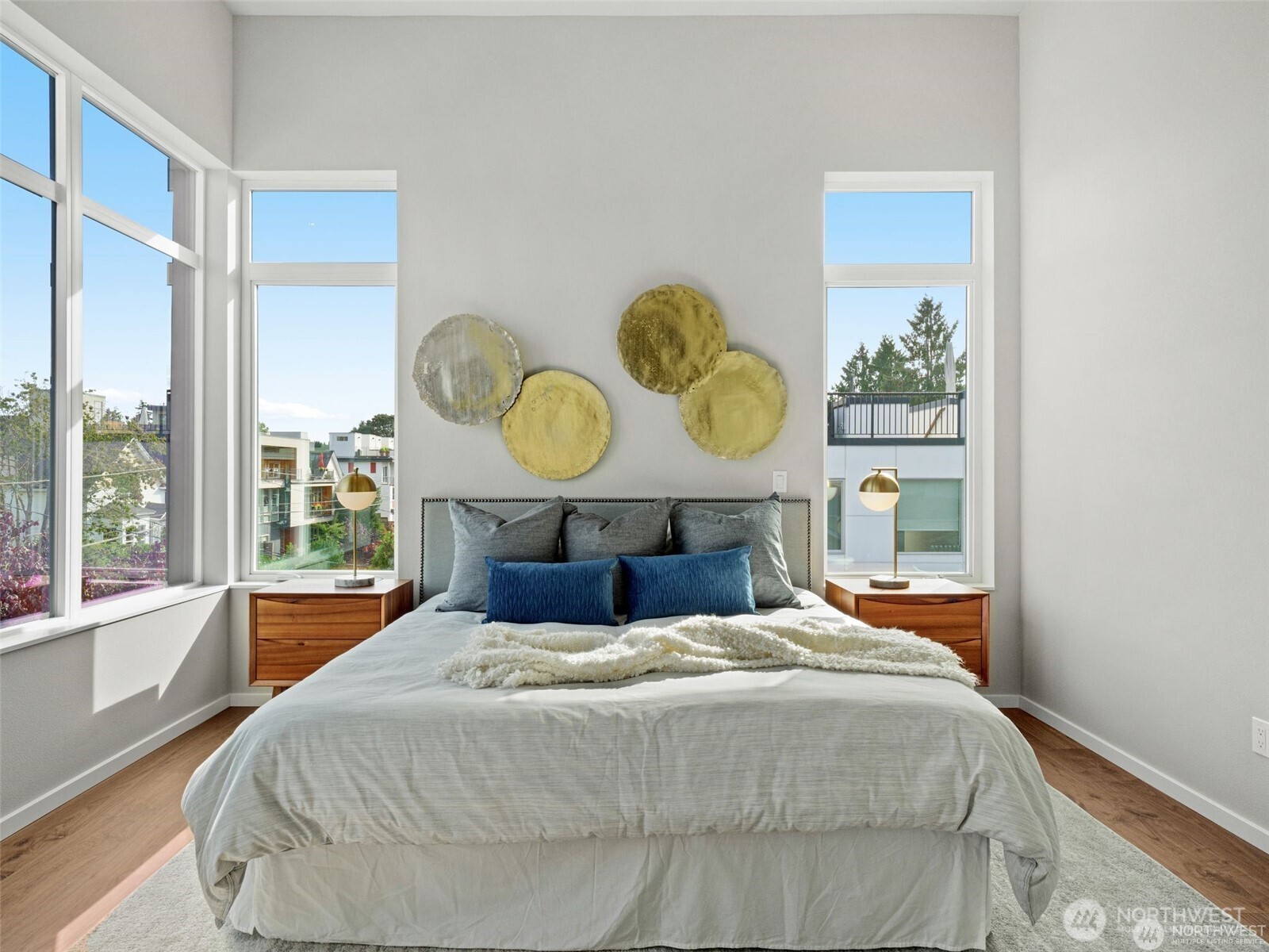 4464 Midvale Avenue North Seattle, WA 98103 - Photo 21 of 27 a bed sitting in a bedroom next to a window