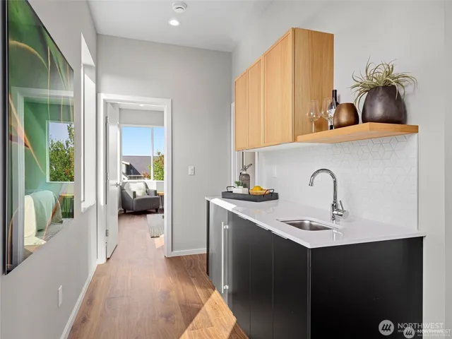 a en suite bathroom with a sink and a mirror