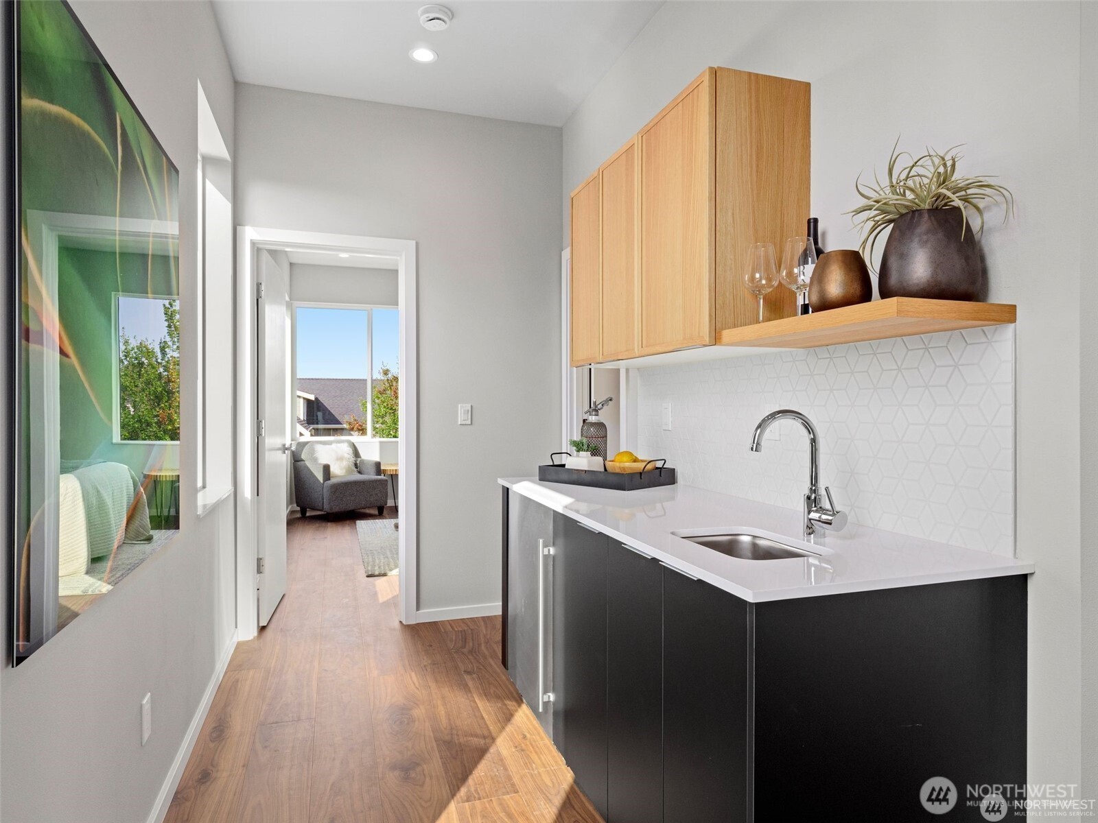 4464 Midvale Avenue North Seattle, WA 98103 - Photo 25 of 27 a en suite bathroom with a sink and a mirror