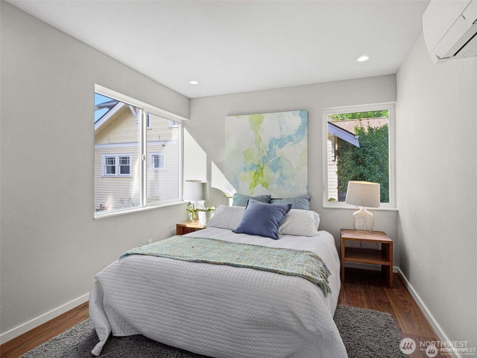 4464 Midvale Avenue North Seattle, WA 98103 - Photo 6 of 27 a bedroom with a bed and a large window