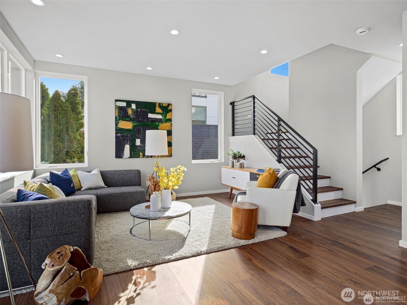 4464 Midvale Avenue North Seattle, WA 98103 - Photo 9 of 27 a living room with furniture and wooden floor