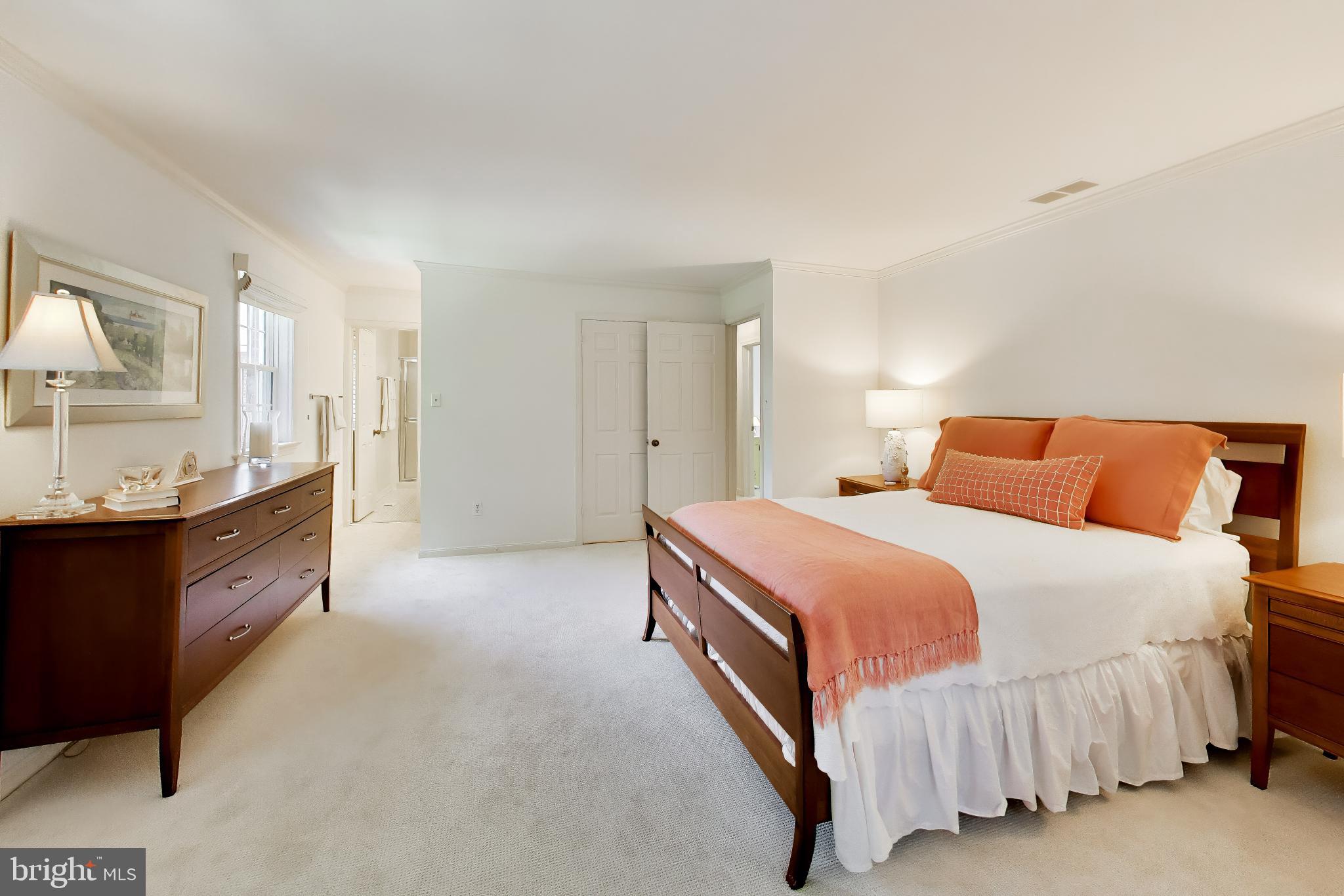 6727 Fairfax Road, Unit 13 Chevy Chase, MD 20815 - Photo 17 of 44 Serene bedroom with soft hues.