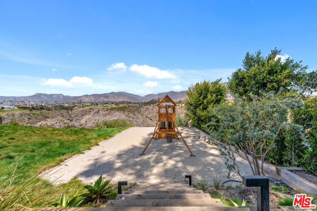 29351 Bluewater Road Malibu, CA 90265 - Photo 14 of 52 a view of a lake with a big yard