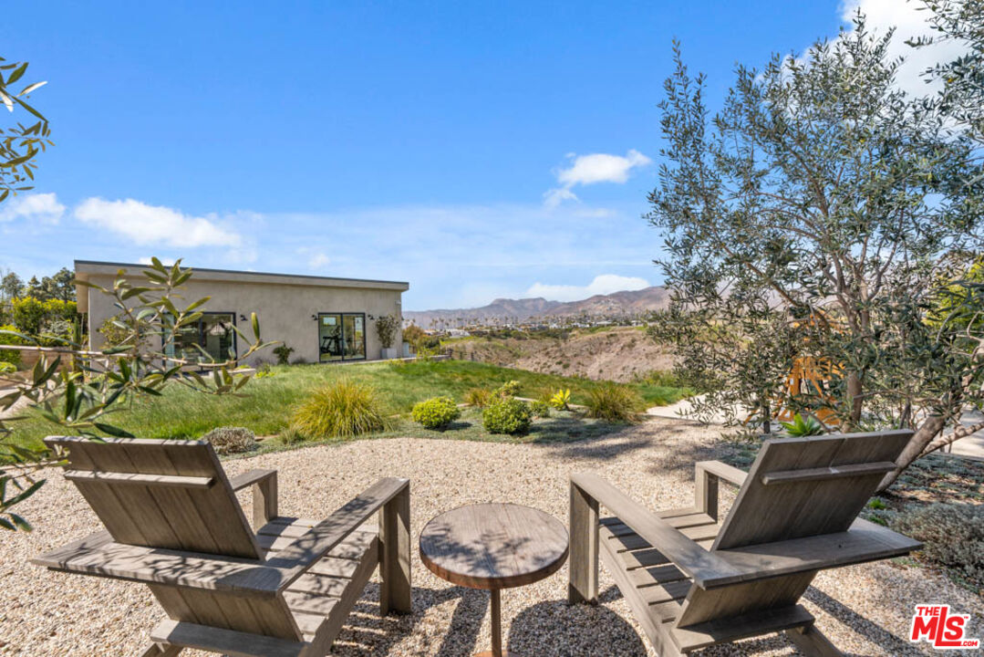 29351 Bluewater Road Malibu, CA 90265 - Photo 16 of 52 a view of a patio in backyard