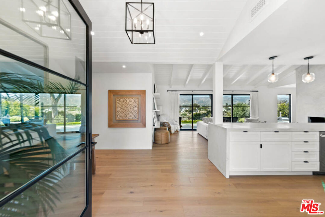 29351 Bluewater Road Malibu, CA 90265 - Photo 26 of 52 a living room with furniture and a large window