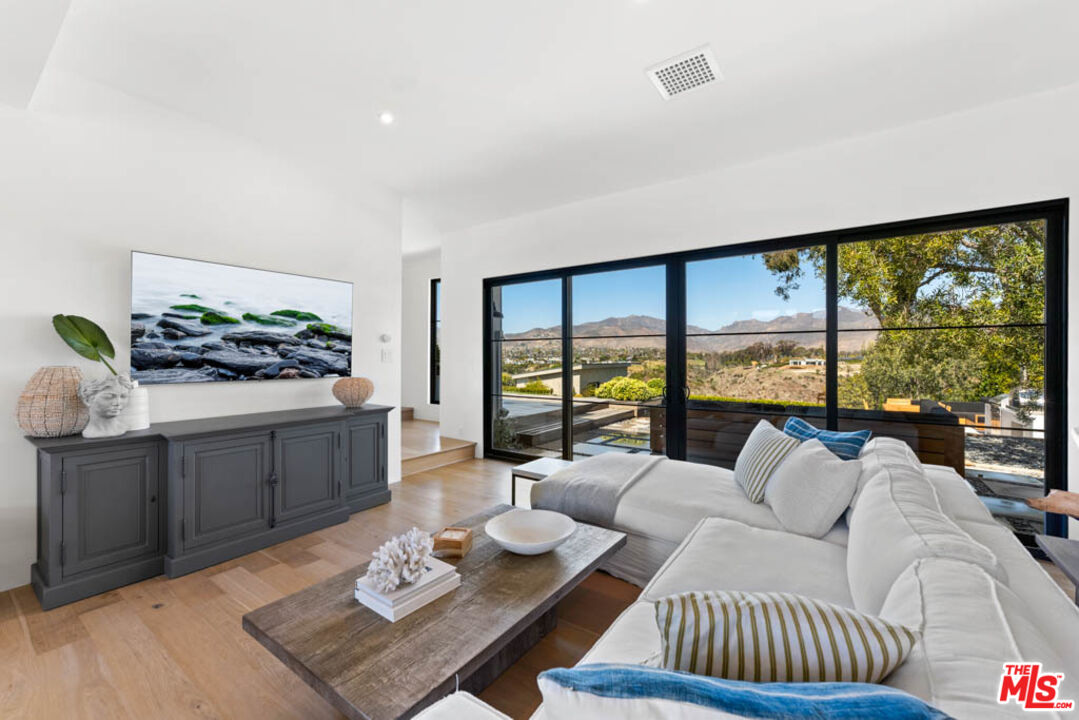29351 Bluewater Road Malibu, CA 90265 - Photo 32 of 52 a living room with furniture and a large window