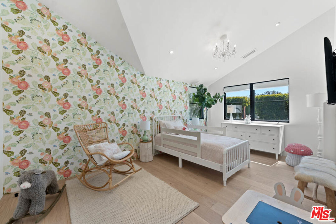 29351 Bluewater Road Malibu, CA 90265 - Photo 42 of 52 a living room with furniture and a flat screen tv