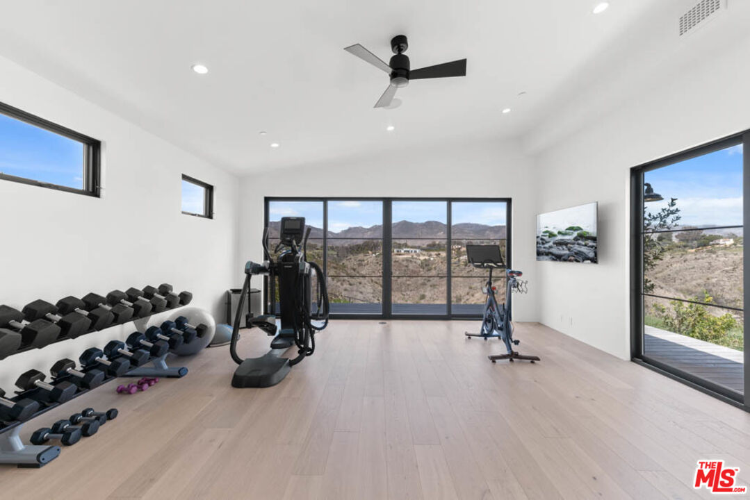 29351 Bluewater Road Malibu, CA 90265 - Photo 52 of 52 a view of a room with gym equipment and large window