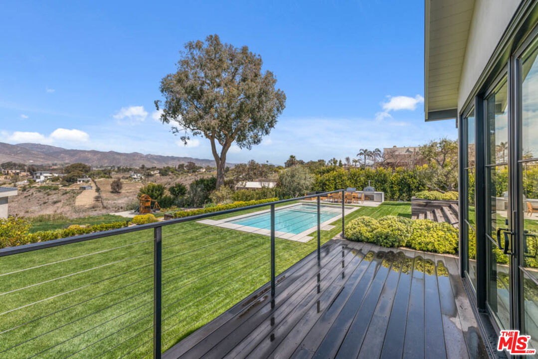 29351 Bluewater Road Malibu, CA 90265 - Photo 6 of 52 a view of city from a balcony