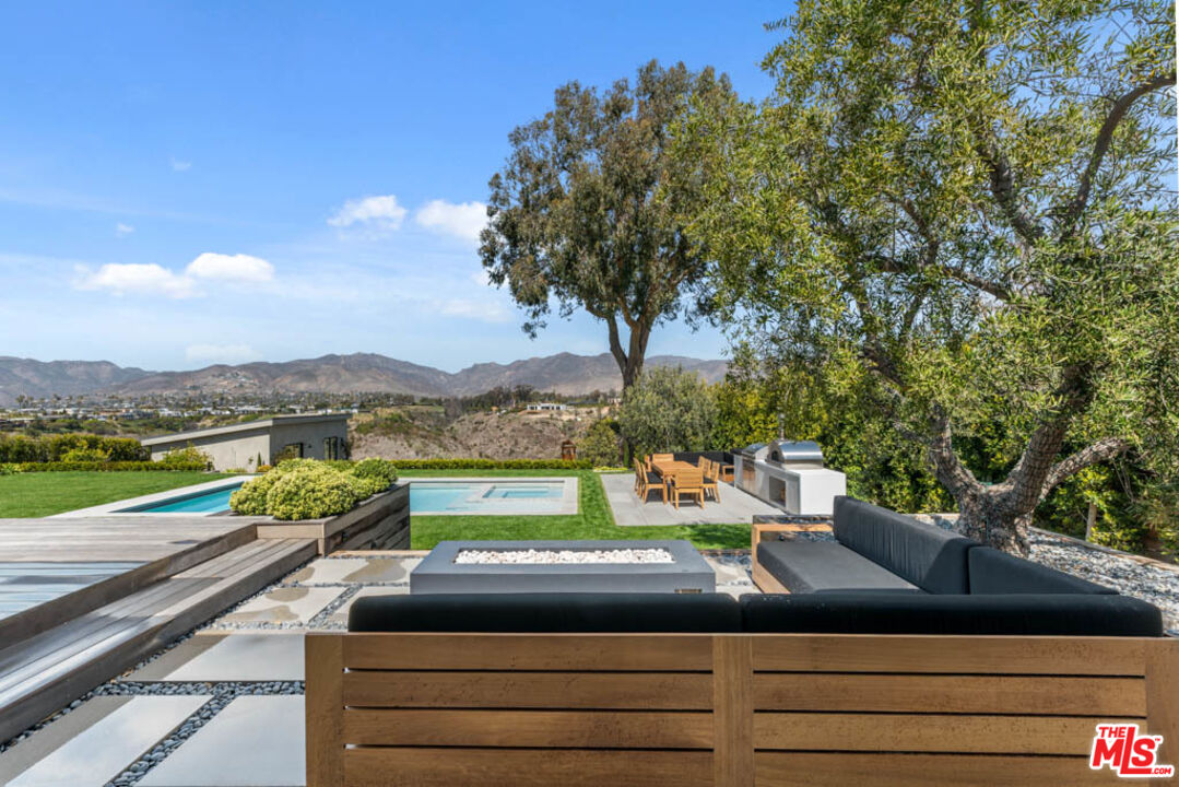 29351 Bluewater Road Malibu, CA 90265 - Photo 7 of 52 a view of a street with an outdoor seating