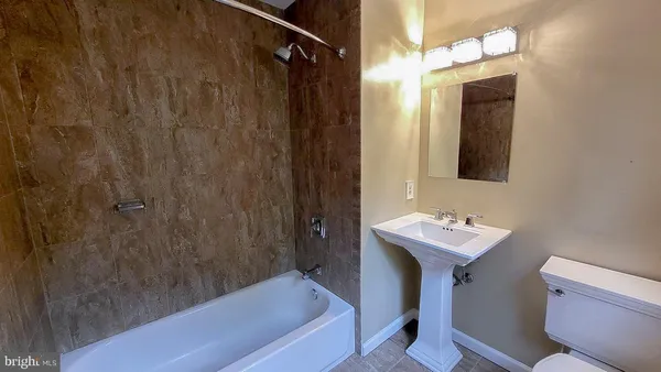 a bathroom with a bathtub