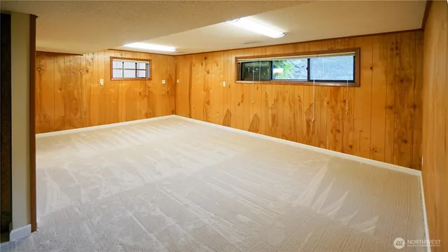 a view of a hallway with a wooden floor