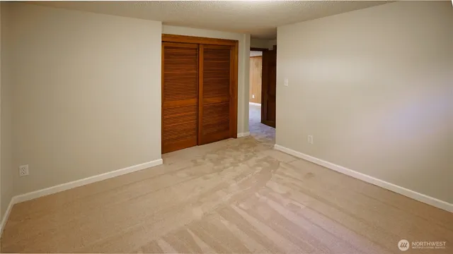 an empty room with closet