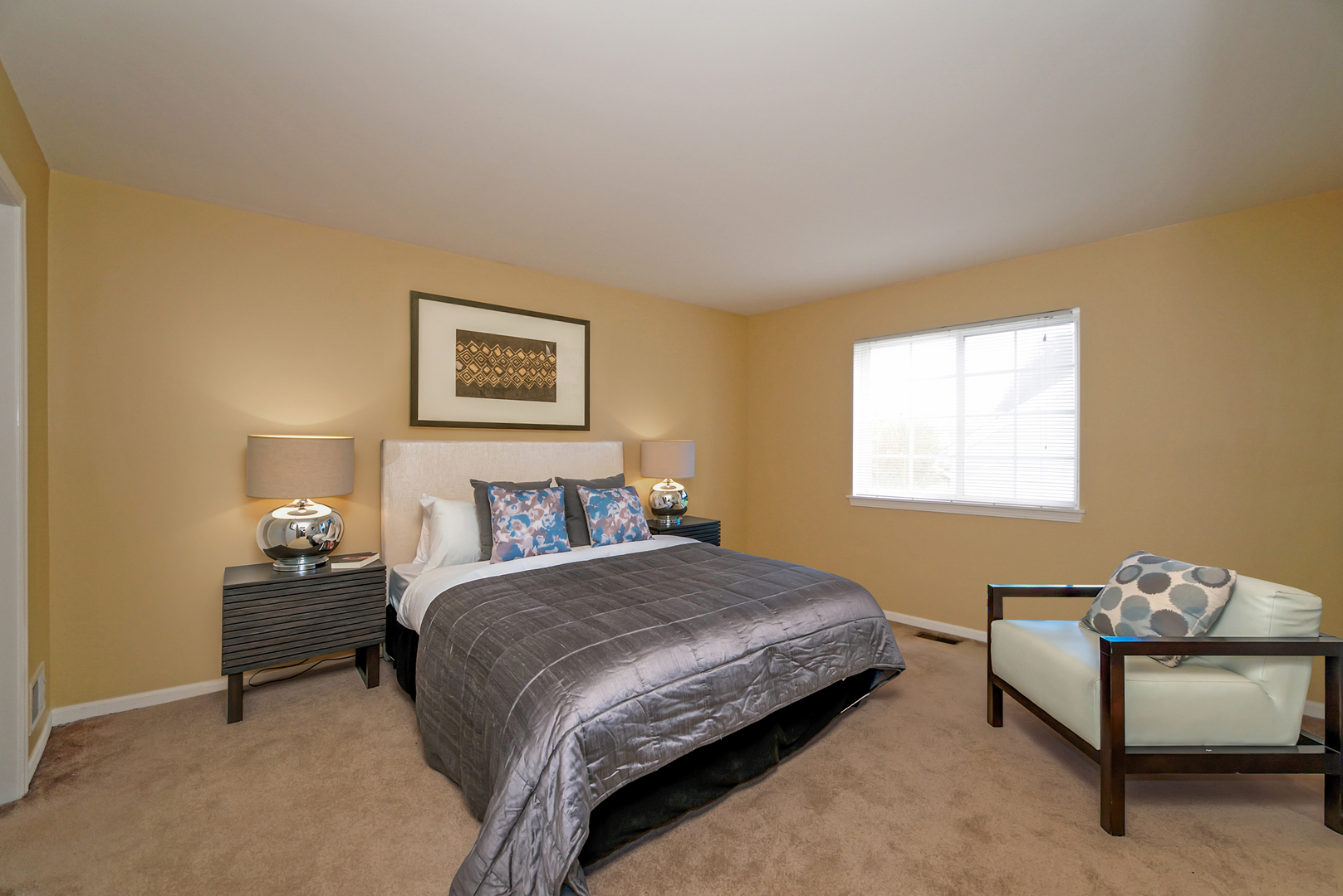 1910 Avalon Drive Wheeling, IL 60090 - Photo 17 of 36 a bedroom with a bed and window