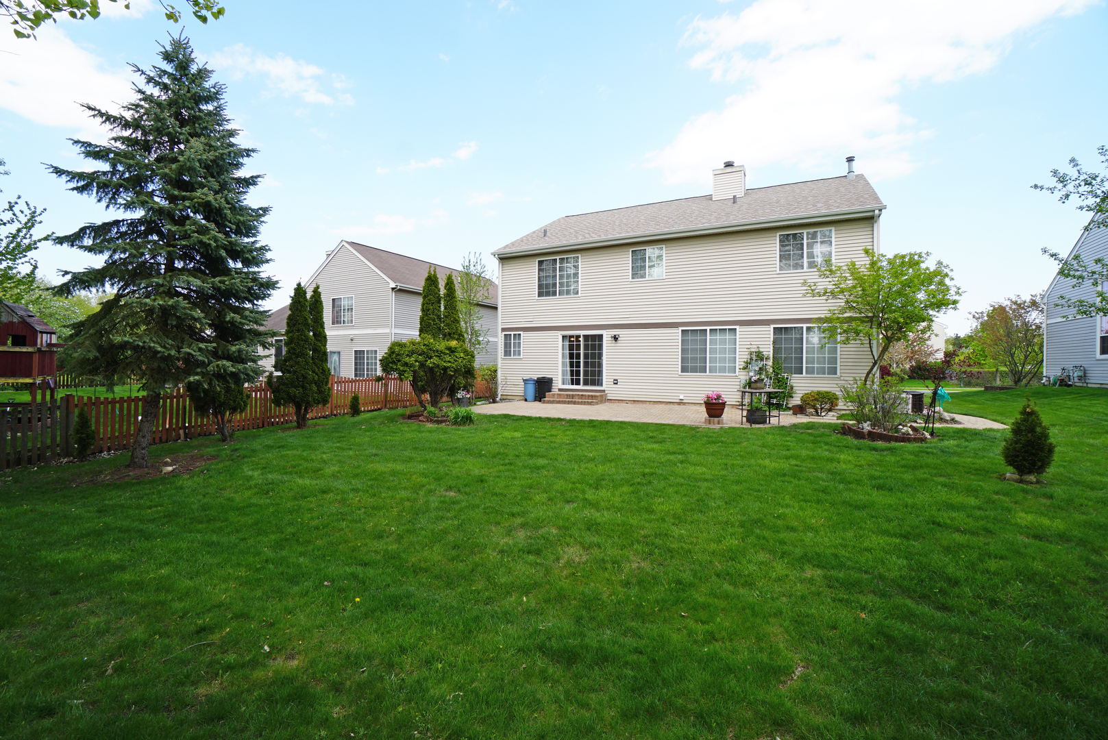 1910 Avalon Drive Wheeling, IL 60090 - Photo 30 of 36 a view of a house with a backyard