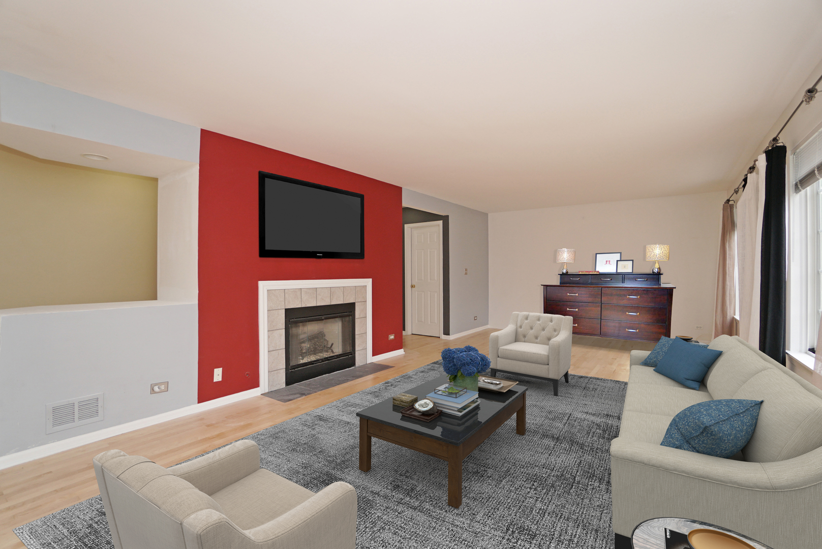 1910 Avalon Drive Wheeling, IL 60090 - Photo 8 of 36 a living room with furniture a flat screen tv and a fireplace