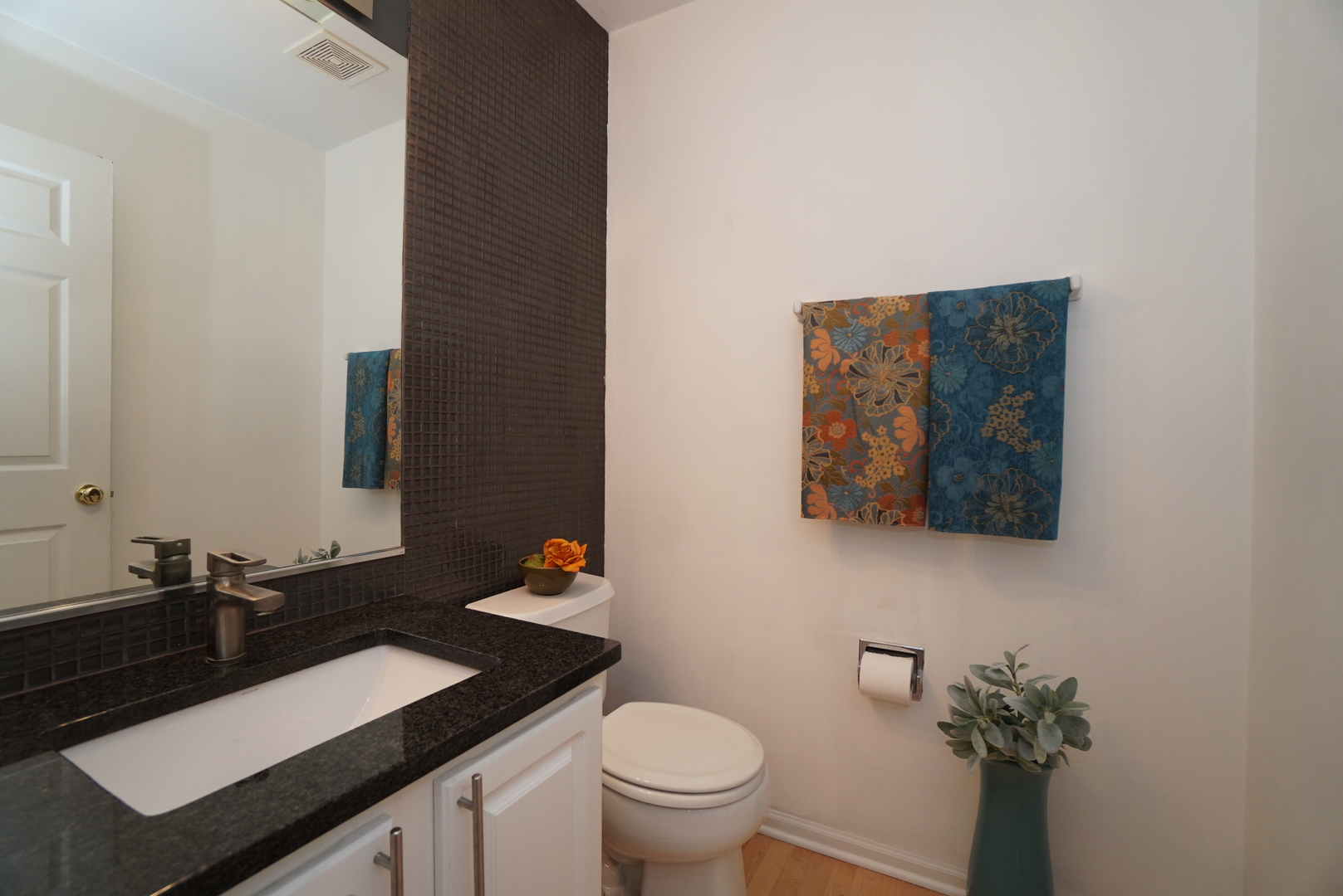 1910 Avalon Drive Wheeling, IL 60090 - Photo 9 of 36 a bathroom with a sink and a toilet