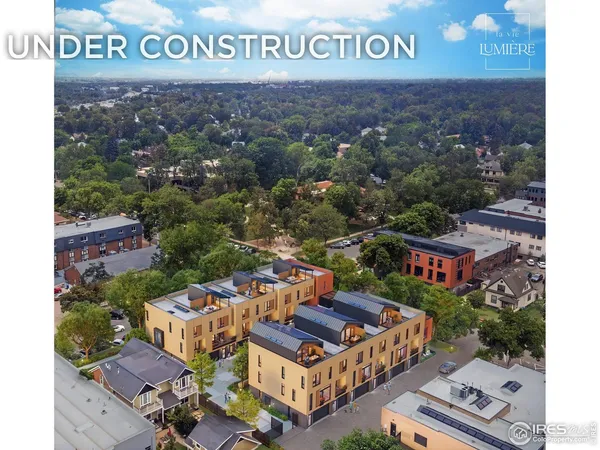 a view of outdoor space with signage and flags