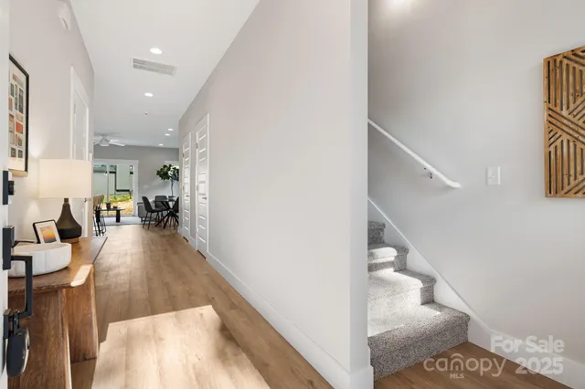 a view of a living room and dining room