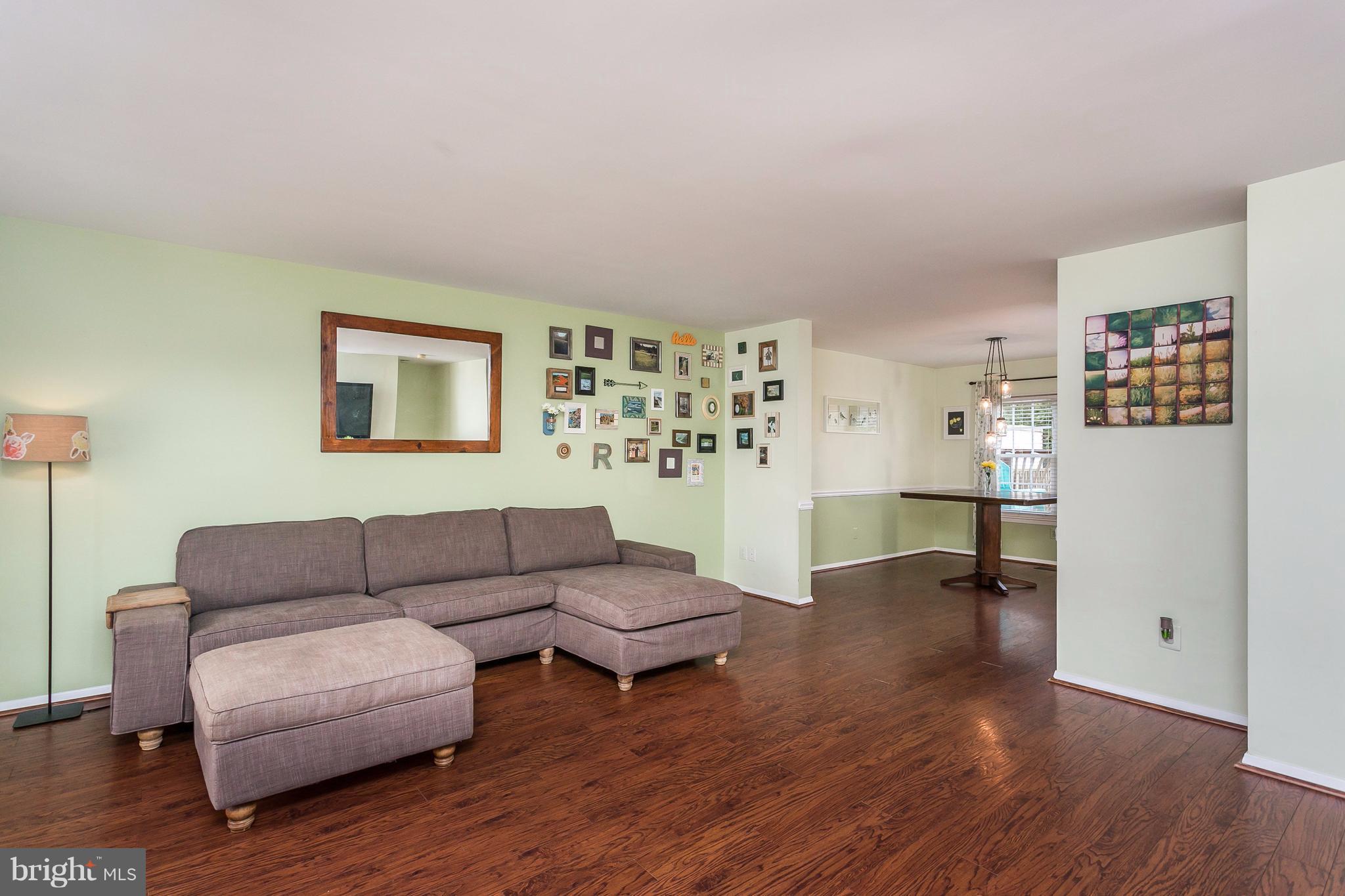 34 Bellfalls Way Baltimore, MD 21236 - Photo 3 of 30 Family Room leads into Dining and Kitchen