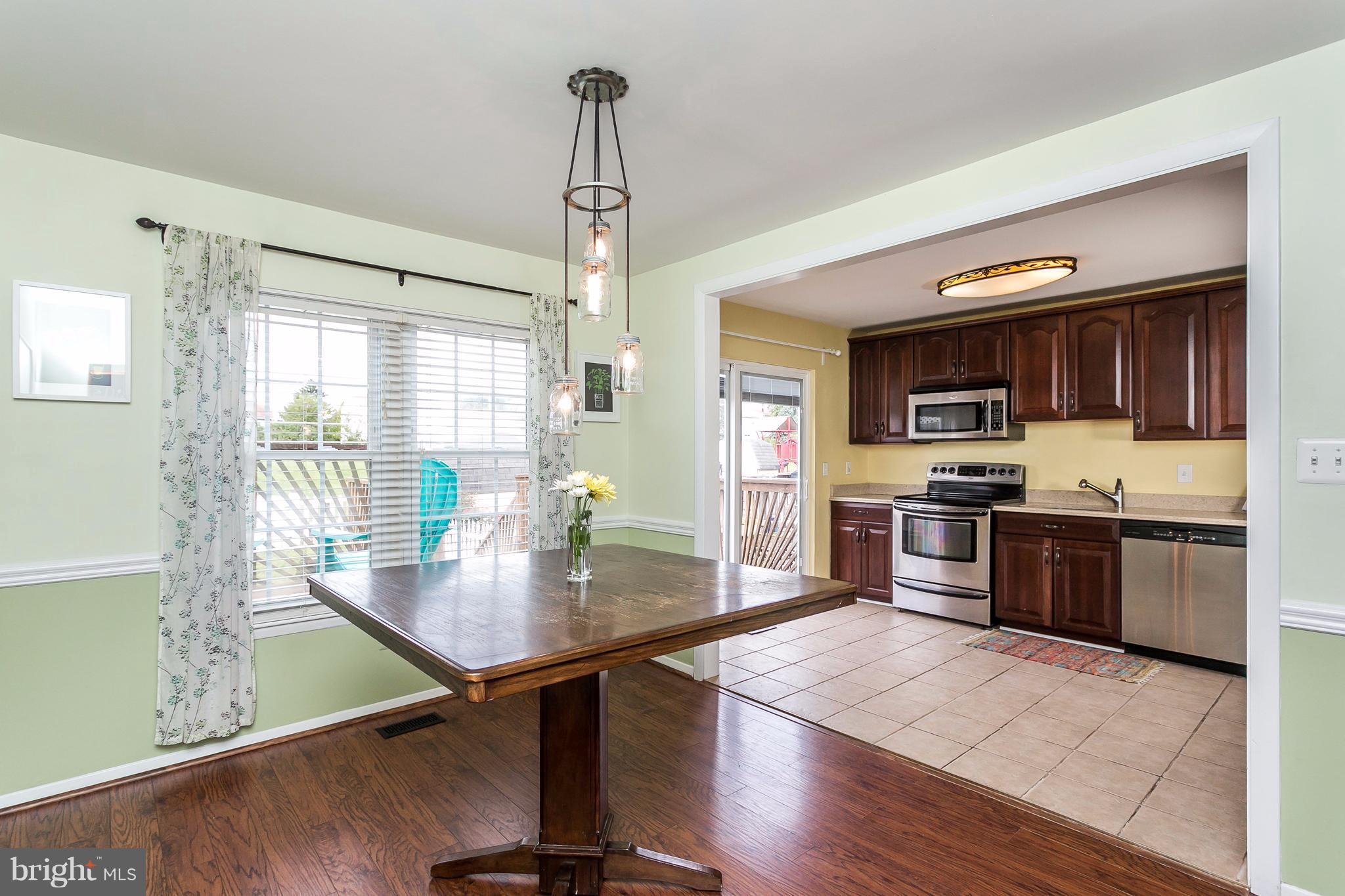 34 Bellfalls Way Baltimore, MD 21236 - Photo 5 of 30 Loads of light in the dining room, view to deck!