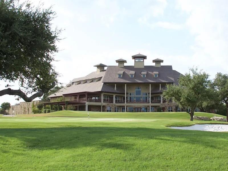8405 Gullane Street Cleburne, TX 76033 - Photo 1 of 37 a view of a house with a big yard and large trees
