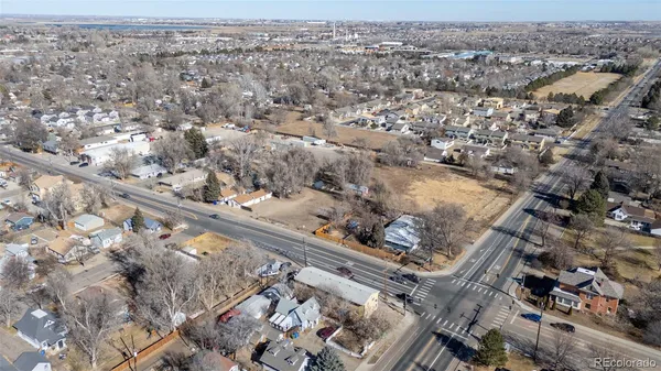 an aerial view of a city and mountain