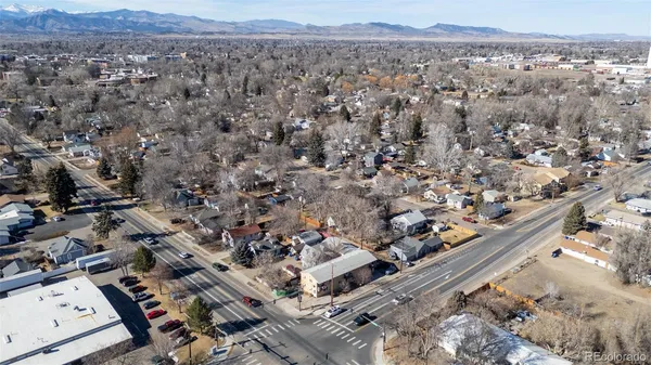 an aerial view of residential house and green space