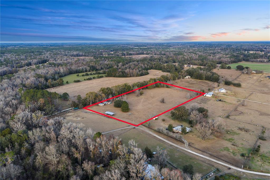 21405 Old Bellamy Road Alachua, FL 32615 - Photo 11 of 17 an aerial view of residential houses with outdoor space