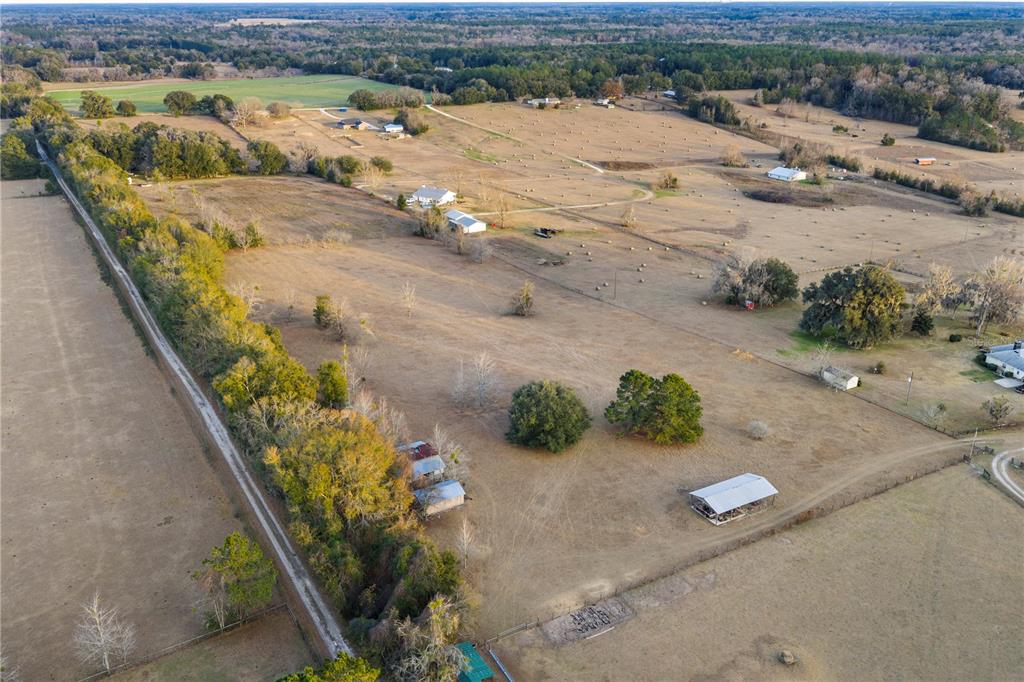 21405 Old Bellamy Road Alachua, FL 32615 - Photo 15 of 17 an aerial view of a house with a yard
