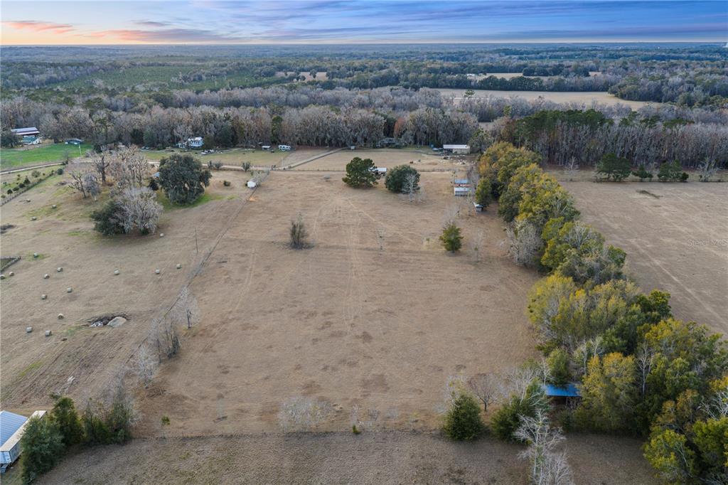 21405 Old Bellamy Road Alachua, FL 32615 - Photo 17 of 17 a view of a lake with mountain