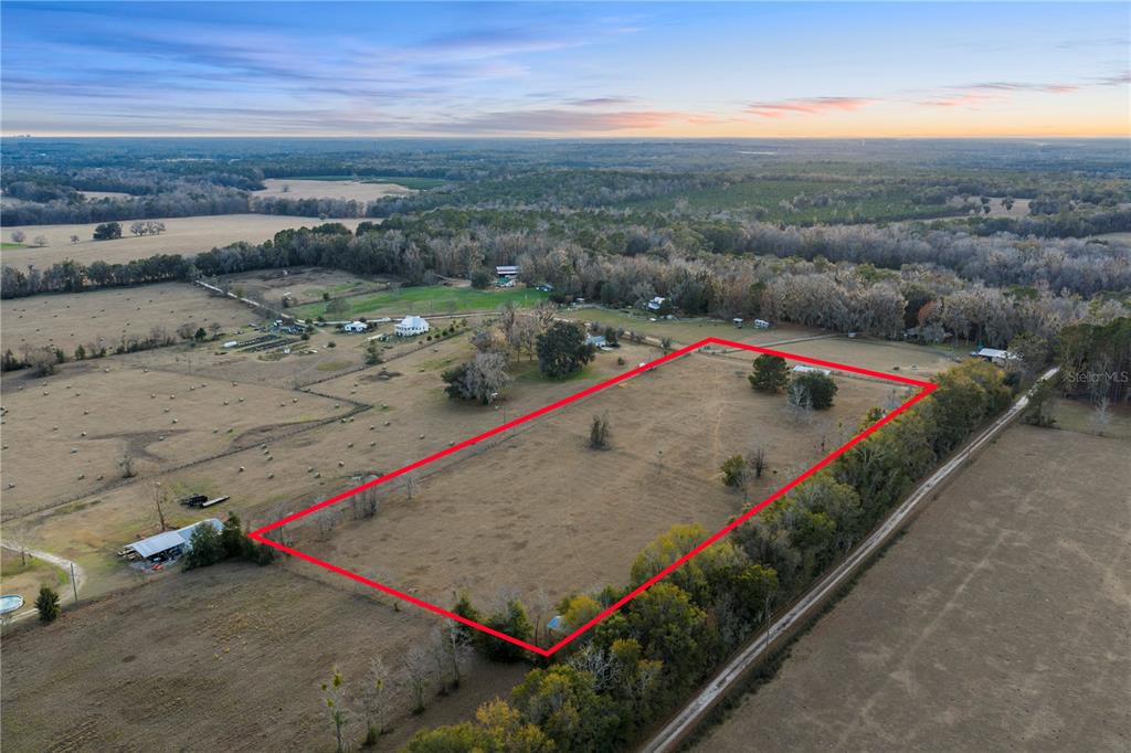 21405 Old Bellamy Road Alachua, FL 32615 - Photo 4 of 17 an aerial view of a houses