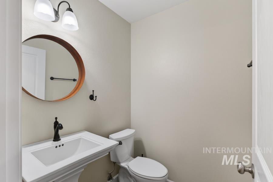 1342 Bristol Road Moscow, ID 83843 - Photo 11 of 26 Half bathroom featuring toilet and a sink