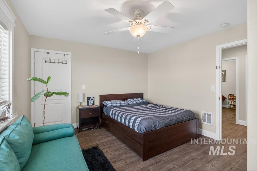 1342 Bristol Road Moscow, ID 83843 - Photo 16 of 26 Bedroom featuring dark wood finished floors and a ceiling fan