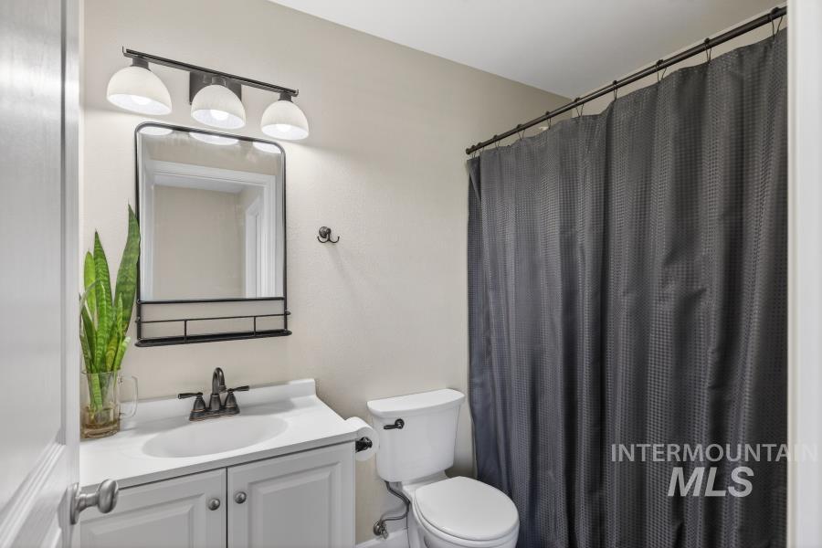 1342 Bristol Road Moscow, ID 83843 - Photo 18 of 26 Full bath with vanity and a shower with shower curtain